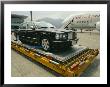 Luxury Bentley Unloaded From An Airplane At Chek Lap Kok Airport by Eightfish Limited Edition Print