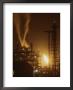 Sparks And Flames Light Up The Night Sky At A Power Plant by Sam Kittner Limited Edition Print