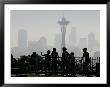 Members Of The Cascade Bike Club Pause And Take In A Foggy View Of The Space Needle by Ted S. Warren Limited Edition Pricing Art Print