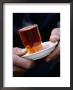 Man Holding A Glass Of Tea, Esfahan, Iran by Mark Daffey Limited Edition Print
