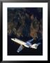 Lear Jet In Flight Over Mountains by Garry Adams Limited Edition Print