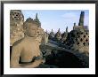 Arupadhatu Buddha, 8Th Century Buddhist Site Of Borobudur, Unesco World Heritage Site, Indonesia by Bruno Barbier Limited Edition Print