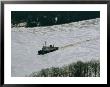 A U.S. Coast Guard Boat Breaks Its Way Through The Icy River by Heather Perry Limited Edition Print