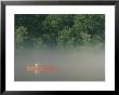 Man Paddling Canoe In Mist, Roanoke River, North Carolina by Skip Brown Limited Edition Print