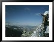 Rappeling With Snowboard, Red Mountain, British Columbia by Mark Cosslett Limited Edition Print