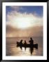Silhouetted Father And Son Fishing From A Canoe by Bob Winsett Limited Edition Print