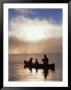 Silhouetted Father And Son Fishing From A Canoe by Bob Winsett Limited Edition Pricing Art Print