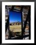 Hut Framed By Window Of Burnt Log Cabin, Wind River Country, Lander, Usa by Brent Winebrenner Limited Edition Print