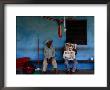 Coconut Farmers Sitting On Porch In Chichicapa, Mexico by Jeffrey Becom Limited Edition Print