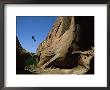 A Silhouetted Climber Rappels Into Kabito Canyon by Bill Hatcher Limited Edition Print