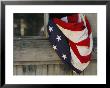 An American Flag Draped Through An Open Barn Window by Raul Touzon Limited Edition Print