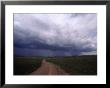 Storm Clouds Over The North Dakota Prairie by Annie Griffiths Belt Limited Edition Print
