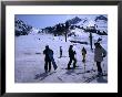 People With Skis And Snowboards At The Bottom Of A Run, Shymbulak, Kazakhstan by Simon Richmond Limited Edition Print