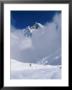 Man Hiking Down From Annapurna Base Camp Into The Clouds, Nepal by Skip Brown Limited Edition Print