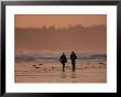 Two People Walk Along The Tidal Flats Of Clayoquot Sound by Joel Sartore Limited Edition Print
