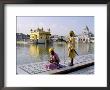 Sikhs In Front Of The Sikhs' Golden Temple, Amritsar, Pubjab State, India by Alain Evrard Limited Edition Print
