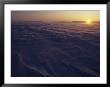 The Sun Sets Over An Arctic Landscape by Paul Nicklen Limited Edition Print