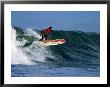 Surfer On Wave At Manu Bay, Raglan, New Zealand by Paul Kennedy Limited Edition Print