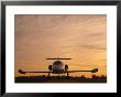 Twilight View Of A Lear Jet On The Runway by Kenneth Garrett Limited Edition Print