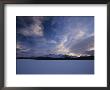 Clouds Fill The Sky Over The Snowy Sawtooth Range by Michael Melford Limited Edition Print