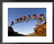 Mountain Biker Catches Air At Rampage Site Near Virgin, Utah, Usa by Chuck Haney Limited Edition Print
