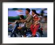 Young Family On Motorcycle., Phnom Penh, Cambodia by John Banagan Limited Edition Print