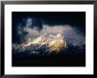 Storm Clouds Over Snow-Capped Mountain, Grand Teton National Park, Usa by Carol Polich Limited Edition Print