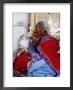 Profile Of Woman In Traditional Embroidered Dress At Mass, Yanque, Peru by Jeffrey Becom Limited Edition Print