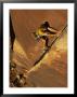 Ralph Ferrara Climbing A Rock Wall In The Utah Desert by Bill Hatcher Limited Edition Pricing Art Print