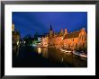 Dijver Lit Up At Dusk With St. Saviour Cathedral In Background, Bruges, West-Vlaanderen, Belgium by Martin Moos Limited Edition Print