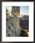 A Man Pretends To Push A Huge Boulder Into The Canyon by W. E. Garrett Limited Edition Print