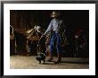 A Cowboy Playfully Lassoes A Kitten by Joel Sartore Limited Edition Print