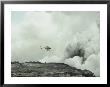 Helicopter Flies Over A Smoking Volcano In Hawaii by Paul Nicklen Limited Edition Pricing Art Print