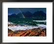 Rainbow Dipping Into Coles Bay During Stormy Weather, Freycinet National Park, Tasmania, Australia by Grant Dixon Limited Edition Print