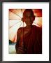 Smiling Monk Holding Umbrella, Mrauk U, Myanmar (Burma) by Frank Carter Limited Edition Print