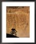 Mountain Biker Pedals Past Rushing Winter Snow Melt At Grand Falls by Bill Hatcher Limited Edition Print