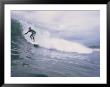 A Surfer Rides A Wave At Hammonds Beach by Rich Reid Limited Edition Print