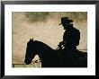 A Silhouette Of A Rancher Riding A Horse by Dugald Bremner Limited Edition Print