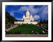 The Sacre Coeur Basilica Is Located At The Top Of Montmatre (Marty'r Hill) In Paris, France by Doug Mckinlay Limited Edition Print