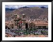 Crowds Mingle On Plaza De Armas In Front Of Church Of La Compania De Jesus, Cuzco, Peru by Grant Dixon Limited Edition Print