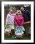 Cousins Pose With Their Easter Baskets, Chevy Chase, Maryland by Stacy Gold Limited Edition Print