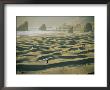 A Windsurfer Walks Across The Sand Dunes Near The Rocky Coastline by Skip Brown Limited Edition Print