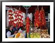 Hanging Chilli And Vegetables At Market, Rovinj, Croatia by Wayne Walton Limited Edition Print