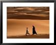 Men Walking Across Sand Dunes, Merzouga And The Dunes, Morocco by Izzet Keribar Limited Edition Print