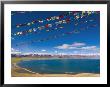 Prayer Flags At Nam Tso Lake, Central Tibet by Michele Falzone Limited Edition Print