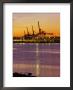 Cranes Unloading Cargo At Burrard Inlet At Dawn, Vancouver, Canada by Ryan Fox Limited Edition Print
