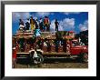 People Standing On Roof Of Crowded Intercity Bus, Port-Au-Prince, Ouest, Haiti by Eric Wheater Limited Edition Print