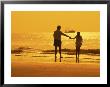 Hilton Head, Father And Daughter Walking On Beach by Jennifer Broadus Limited Edition Pricing Art Print