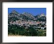 Village Of Aggius Surrounded By Lunar Landscape, Sassari, Sardinia, Italy by Dallas Stribley Limited Edition Print