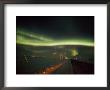 The Aurora Borealis Streaks Across The Evening Sky by Norbert Rosing Limited Edition Pricing Art Print